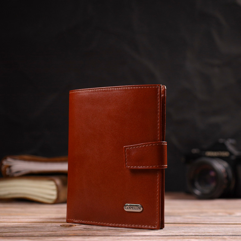 Привлекательный вертикальный мужской бумажник среднего размера из натуральной гладкой кожи CANPELLINI Коричневый