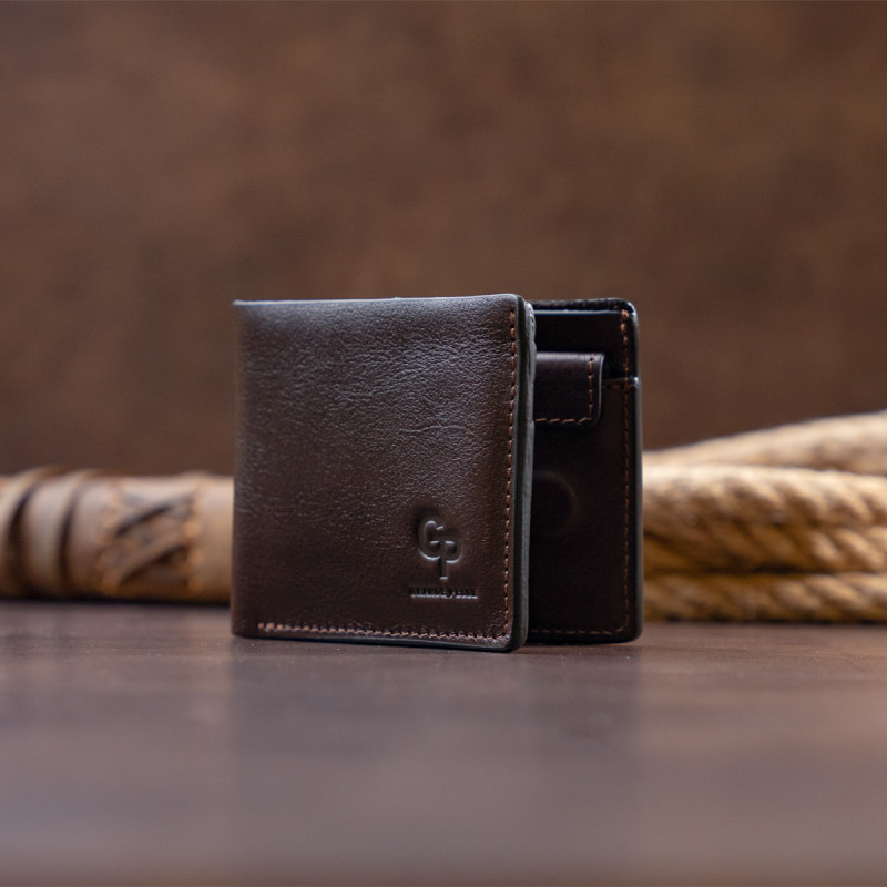 Якісне портмоне в гладкій шкірі на магнітах GRANDE PELLE Коричневе