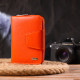Яскраве вертикальне портмоне для жінок із монетницею на блискавці з натуральної шкіри флотар CANPELLINI Помаранчеве