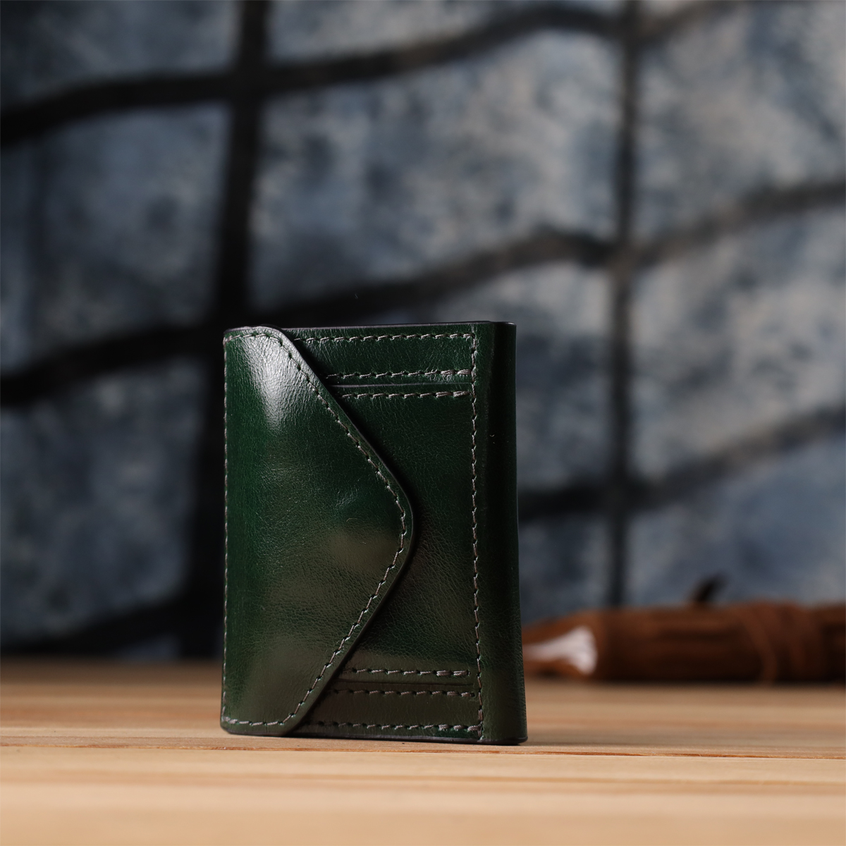 Відмінний гаманець у три складання з натуральної гладкої шкіри GRANDE PELLE Зелений
