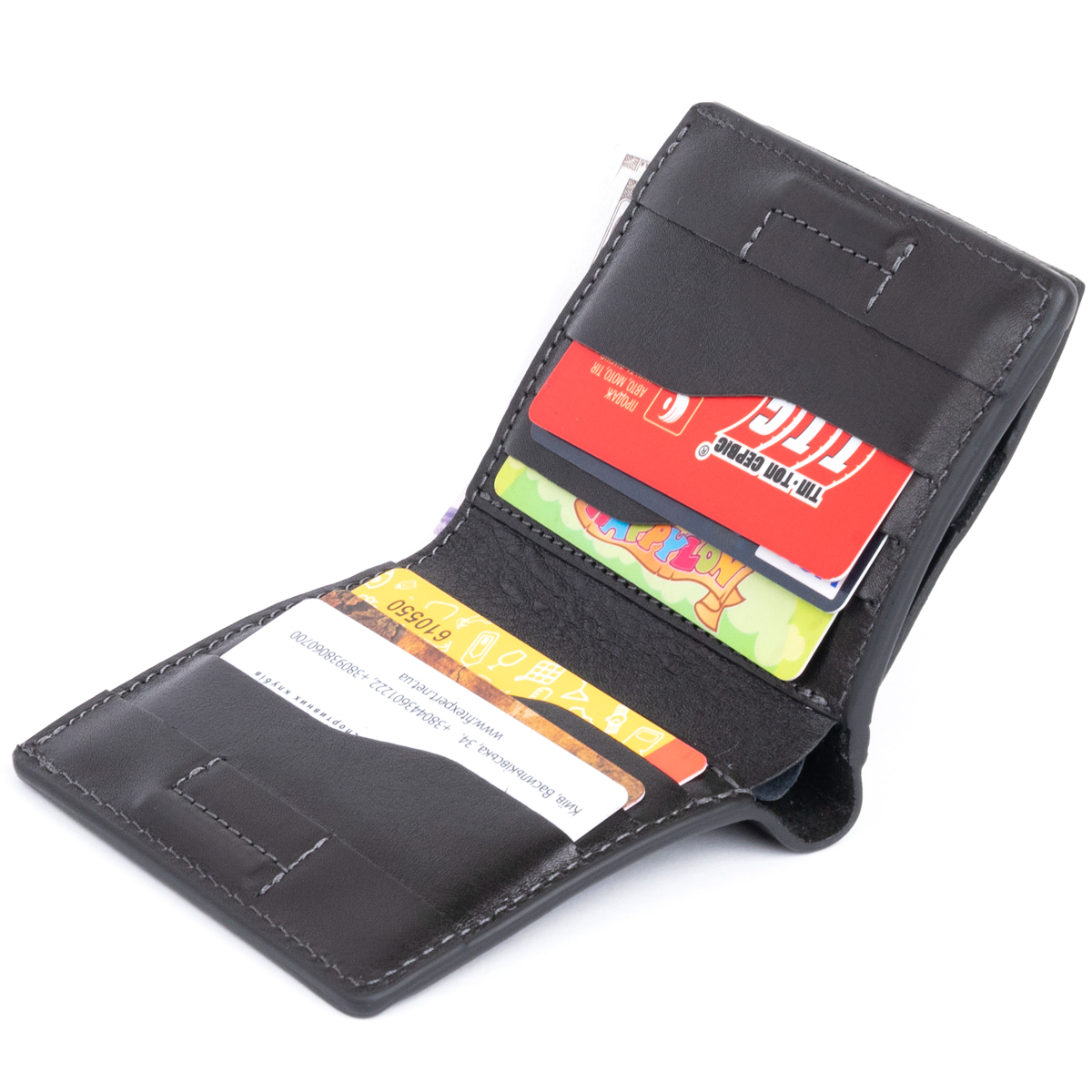 Вертикальне глянсове портмоне з накладною монетницьою GRANDE PELLE Чорне