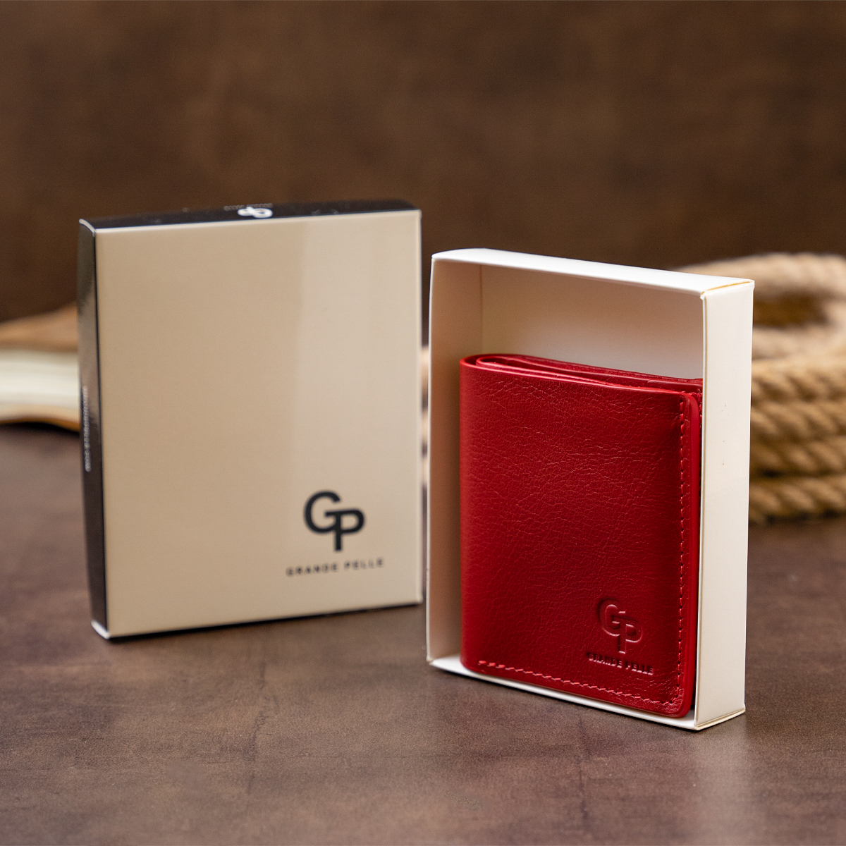 Вертикальне глянсове портмоне з накладною монетницьою GRANDE PELLE Червоне