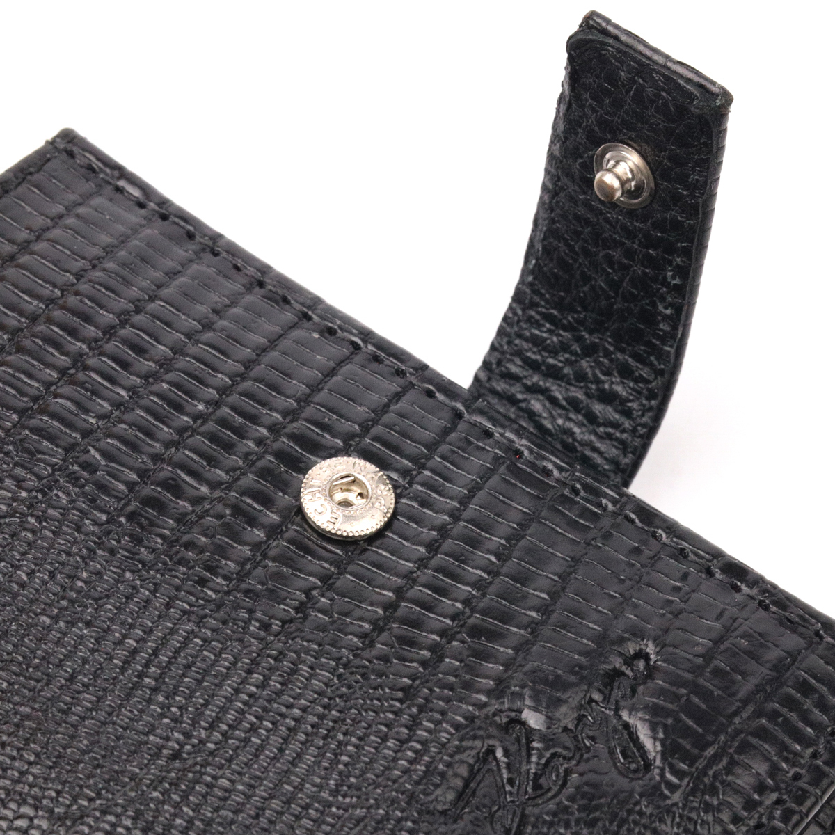 Практичный вертикальный небольшой мужской кошелек из фактурной кожи KARYA Черный